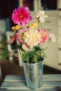 Colourful flowers arranged in a vase at Blue Fattoria